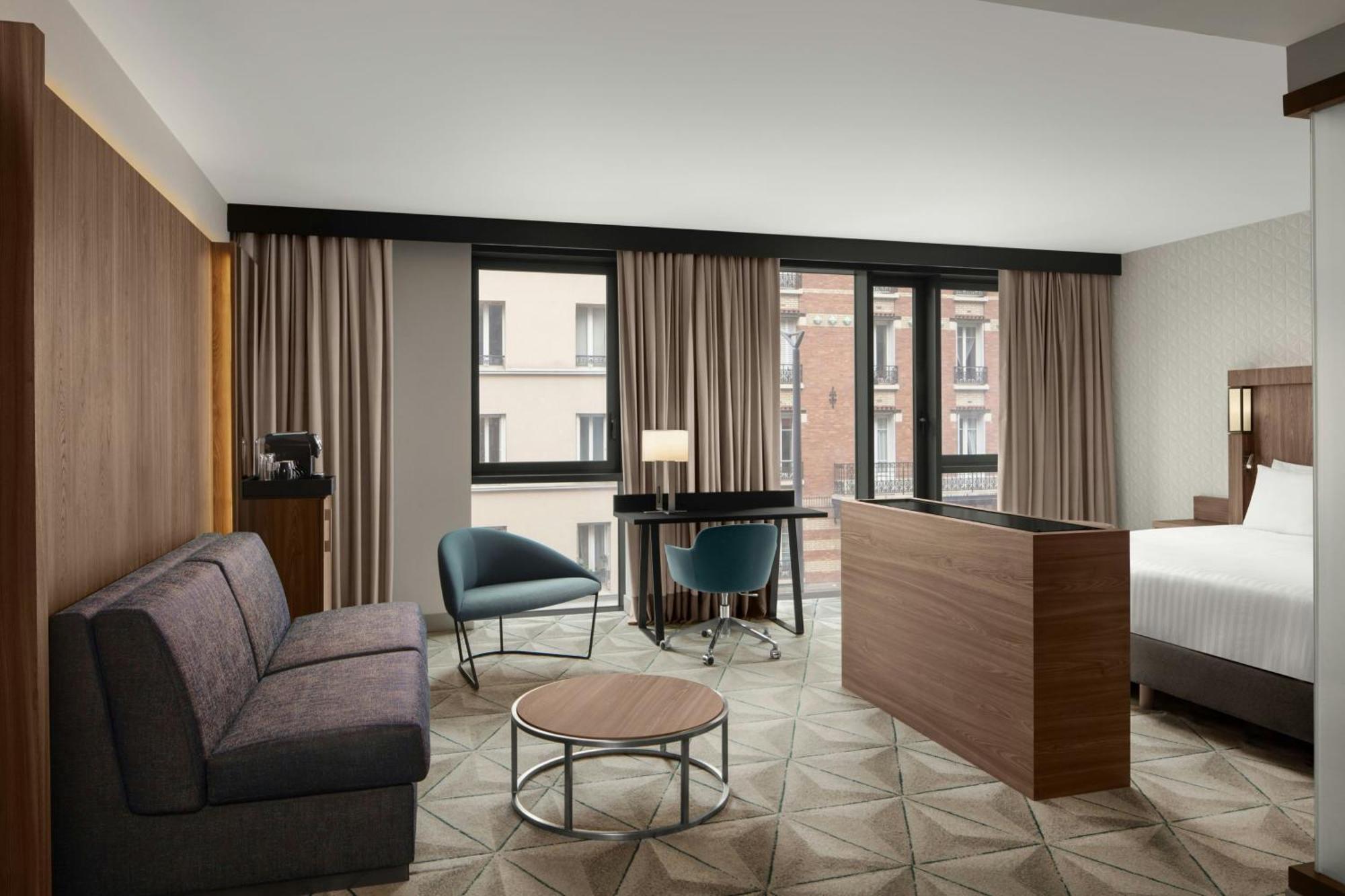 คอร์ตยาร์ด ปารีส ปอร์ต เดอ แวร์ซาย Hotel อิซซีเลมูลิโนต์ ภายนอก รูปภาพ