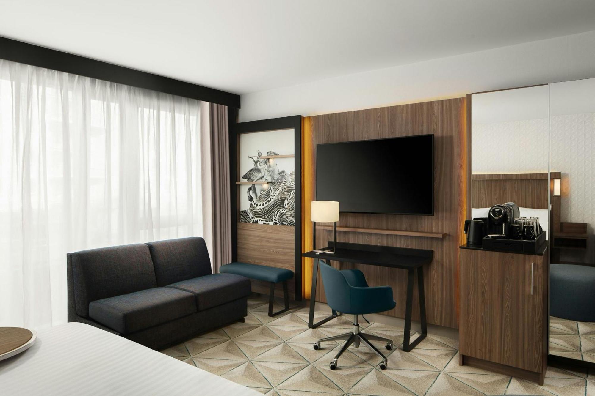 คอร์ตยาร์ด ปารีส ปอร์ต เดอ แวร์ซาย Hotel อิซซีเลมูลิโนต์ ภายนอก รูปภาพ