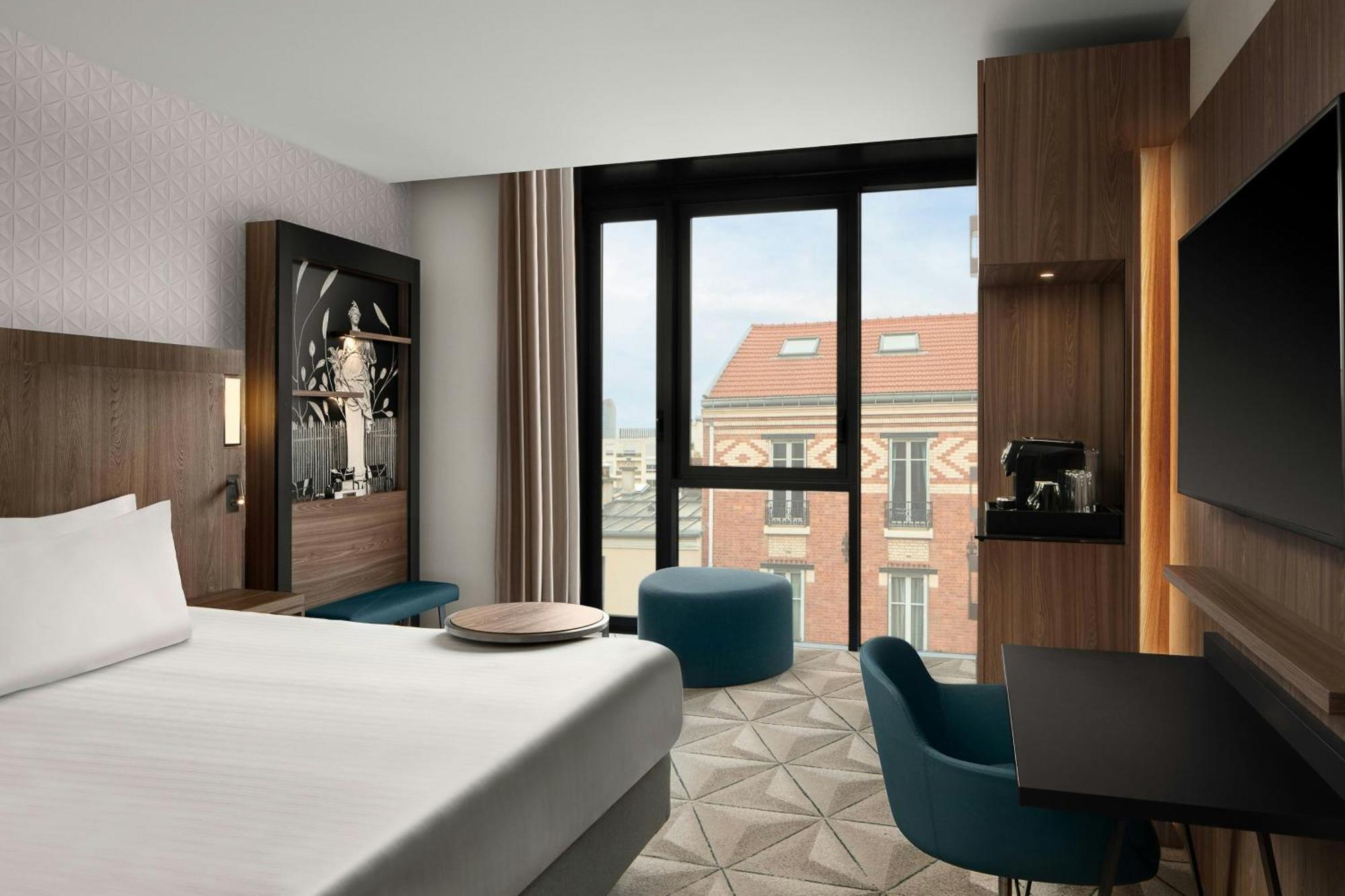 คอร์ตยาร์ด ปารีส ปอร์ต เดอ แวร์ซาย Hotel อิซซีเลมูลิโนต์ ภายนอก รูปภาพ